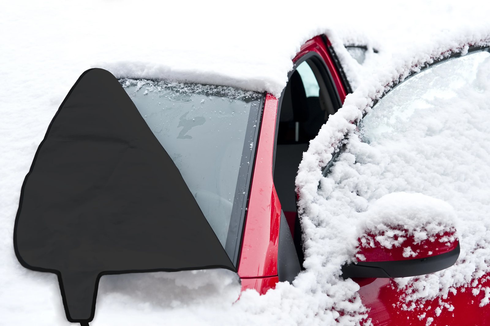 Person removing Custom SnowShade from a windshield